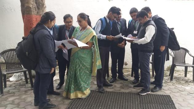 Students of City Montessori School, LDA branch discussing their paper with teacher in Lucknow on Monday. (SOURCED) Students of City Montessori School, LDA branch discussing their paper with teacher in Lucknow on Monday. (SOURCED)