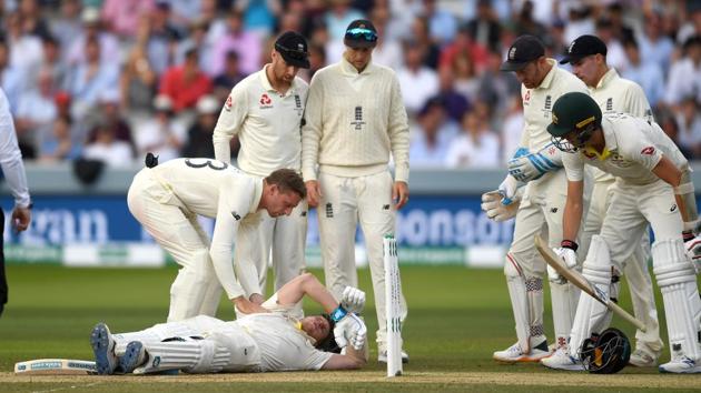 Jos Buttler, Jack Leech and Joe Root of England check on Steven Smith of Australia as he lies on the ground after been hit in the head by a ball from Jofra Archer of England during day four of the 2nd Specsavers Ashes Test match at Lord's Cricket Ground on August 17, 2019 in London, England. (Getty Images) Jos Buttler, Jack Leech and Joe Root of England check on Steven Smith of Australia as he lies on the ground after been hit in the head by a ball from Jofra Archer of England during day four of the 2nd Specsavers Ashes Test match at Lord's Cricket Ground on August 17, 2019 in London, England. (Getty Images)