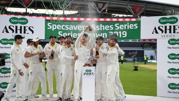 Tim Paine of Australia lifts the Ashes Urn with his teammates during Day Four of the 5th Specsavers Ashes Test between England and Australia(Getty Images)