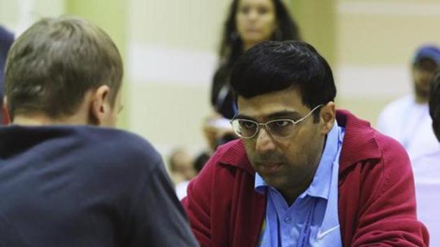 Former World Chess Champion Viswanathan Anand with his wife Aruna and son  Akhil arrives at
