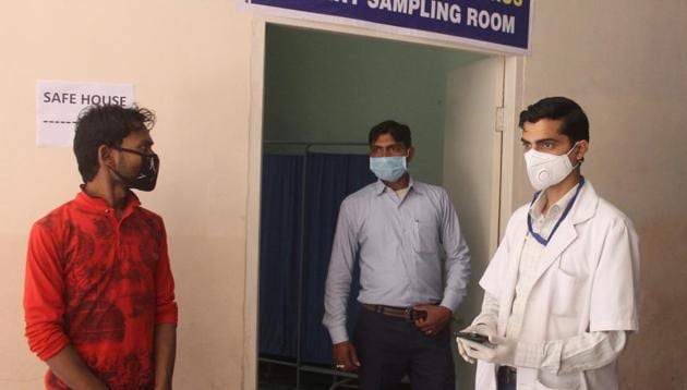 Gurugram, India- March 16, 2020: Doctors seen wearing protective masks as a precautionary measure amid rising coronavirus scare at Civil Hospital, Sector 10, in Gurugram, India, on Monday, 16 March 2020. (Photo by Yogendra Kumar/Hindustan Times)(Yogendra Kumar/HT PHOTO) Gurugram, India- March 16, 2020: Doctors seen wearing protective masks as a precautionary measure amid rising coronavirus scare at Civil Hospital, Sector 10, in Gurugram, India, on Monday, 16 March 2020. (Photo by Yogendra Kumar/Hindustan Times)(Yogendra Kumar/HT PHOTO)