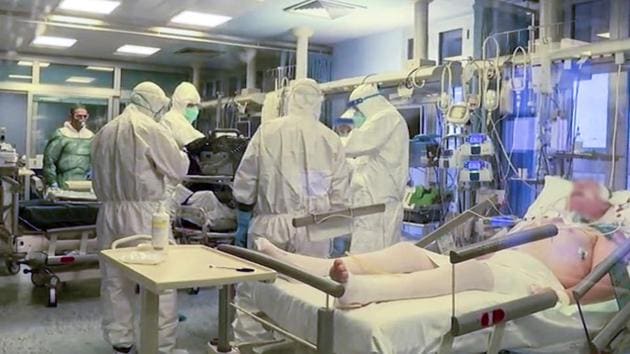 Medical staff treat coronavirus patients in an ICU at the Cremona hospital in northern Italy. The most devastating medical crisis in Italy since World War Two is forcing doctors, patients and their families to make decisions that Marco Resta, deputy head of Policlinico San Donato’s Intensive Care Unit, a former military doctor, told Reuters he has not experienced even in war. (LA7 PIAZZAPULITA via REUTERS TV) Medical staff treat coronavirus patients in an ICU at the Cremona hospital in northern Italy. The most devastating medical crisis in Italy since World War Two is forcing doctors, patients and their families to make decisions that Marco Resta, deputy head of Policlinico San Donato’s Intensive Care Unit, a former military doctor, told Reuters he has not experienced even in war. (LA7 PIAZZAPULITA via REUTERS TV)