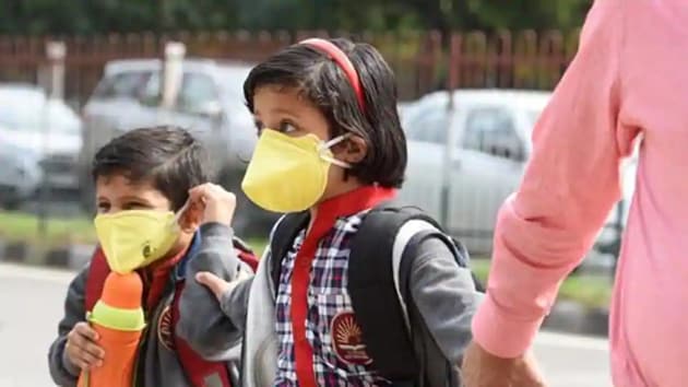 School students seen wearing protective masks as a precautionary measure against coronavirus, New Delhi, March 5, 2020. (Sanchit Khanna/HT PHOTO)
