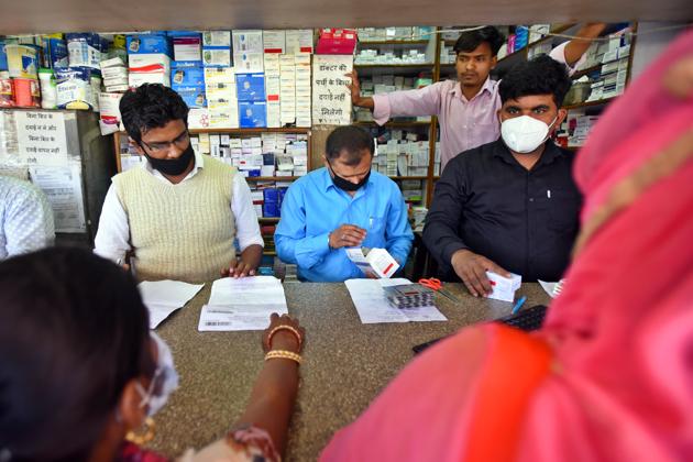 Operators at a medical store are seen wearing protective masks following multiple positive cases of coronavirus in the country, outside a hospital. (Amal KS/HT PHOTO) Operators at a medical store are seen wearing protective masks following multiple positive cases of coronavirus in the country, outside a hospital. (Amal KS/HT PHOTO)