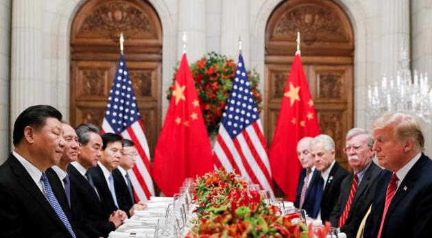 US President Donald Trump, U.S. Secretary of State Mike Pompeo, U.S. President Donald Trump's national security adviser John Bolton and Chinese President Xi Jinping attend a working dinner after the G20 leaders summit in Buenos Aires, Argentina December 1, 2018.(File photo: Reuters)