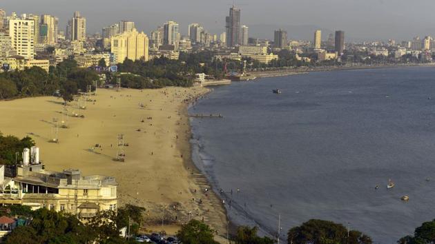 An aerial view of Girgaon chowpatty in the evening, where usually, large numbers of people throng the beach. Mumbai, a metropolis of 18 million people, has also authorised hospital and airport authorities to stamp the wrists of those ordered to self-isolate with indelible ink reading “Home Quarantined” and displaying the date the quarantine ends. (Anshuman Poyrekar / HT Photo)