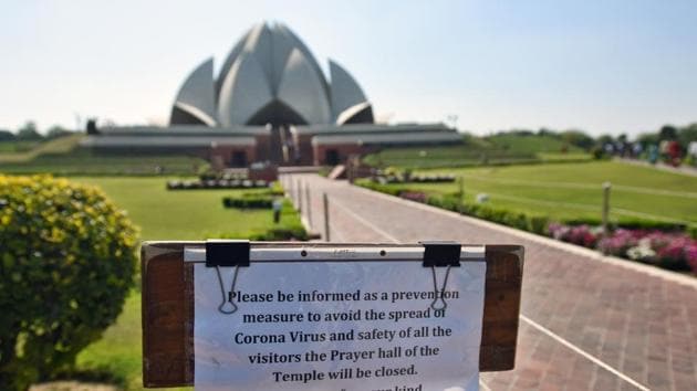 A notice seen at Lotus Temple after it was closed as a precaution against COVID-19, in New Delhi. With the number of positive cases approaching 150 in India, public monuments in the national capital have been shut till the end of this month. Union Tourism Minister Prahlad Patel had on Monday said all national monuments and museums under the Archaeological Survey of India (ASI) will remain closed till March 31. (Amal KS / HT Photo)