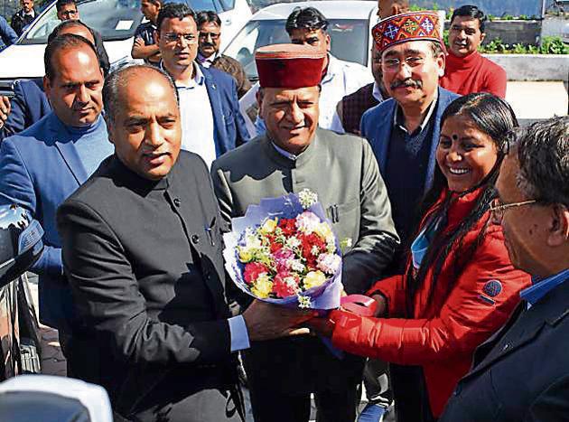 Chief minister Jai Ram Thakur presenting a bouquet to Indu Goswami outside the HP Vidhan Sabha in Shimla. (Deepak Sansta/ HT) Chief minister Jai Ram Thakur presenting a bouquet to Indu Goswami outside the HP Vidhan Sabha in Shimla. (Deepak Sansta/ HT)