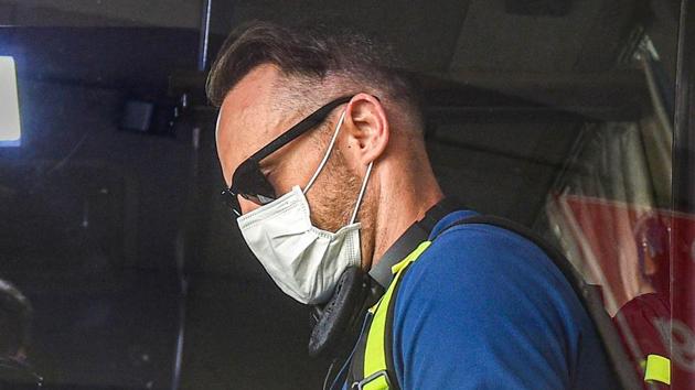 South Africa player Faf du Plessis wear a mask as a preventive measure against coronavirus, during his arrival with teammates, at NSCBI Aiport, in Kolkata, Monday, March 16, 2020.(PTI)