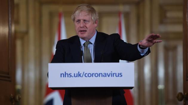 Boris Johnson, U.K. prime minister, gestures while speaking during a coronavirus news conference inside number 10 Downing Street in London, U.K., on Wednesday, March 18, 2020. (Bloomberg)