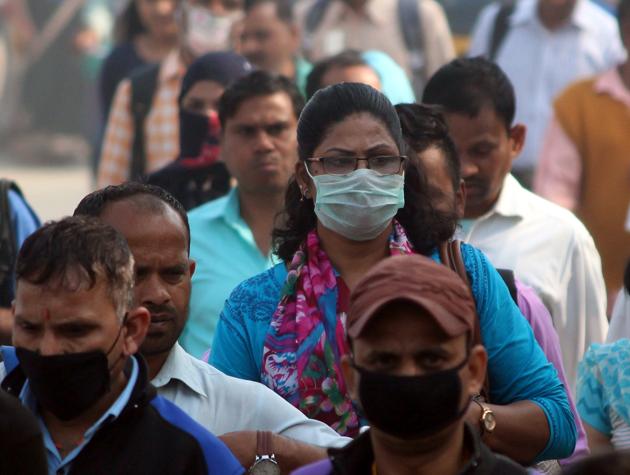 Covid 19 update in Gurugram: People wearing protective masks as a precautionary measure against coronavirus scare at Dundahera Kapashera Border, near Udyog Vihar, in Gurugram. (Yogendra Kumar/HT PHOTO) Covid 19 update in Gurugram: People wearing protective masks as a precautionary measure against coronavirus scare at Dundahera Kapashera Border, near Udyog Vihar, in Gurugram. (Yogendra Kumar/HT PHOTO)