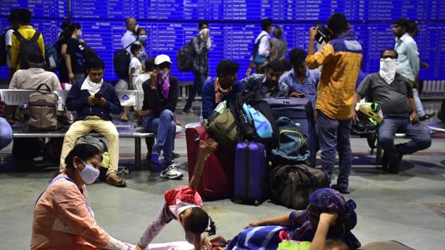 Passenger wearing mask ,await for their long distance railway at CSTM in Mumbai, on Tuesday, March 17, 2020. (Anshuman Poyrekar / HT Photo) Passenger wearing mask ,await for their long distance railway at CSTM in Mumbai, on Tuesday, March 17, 2020. (Anshuman Poyrekar / HT Photo)