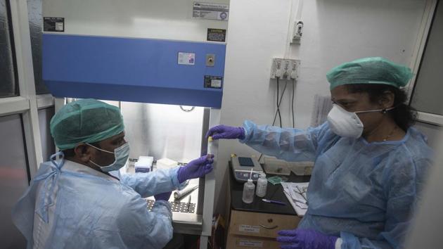 B J Government Medical College's Molecular lab prepares for coronavirus testing at Sassoon hospital in Pune, Thursday, March 19, 2020. (Pratham Gokhale/HT Photo) B J Government Medical College's Molecular lab prepares for coronavirus testing at Sassoon hospital in Pune, Thursday, March 19, 2020. (Pratham Gokhale/HT Photo)
