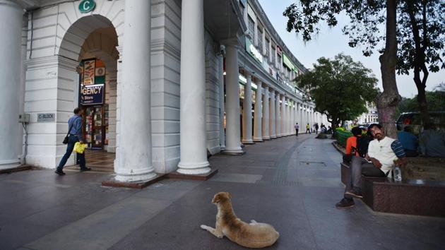 A near empty view of the corridors of Connaught Place market amid coronavirus concerns. The Delhi government on Thursday stepped up sweeping restrictions to prevent community spread of the novel coronavirus disease (COVID-19) by prohibiting gatherings of more than 20 people and ordering the closure of all dine-in restaurants in the Capital till March 31. (Ajay Aggarwal / HT Photo) A near empty view of the corridors of Connaught Place market amid coronavirus concerns. The Delhi government on Thursday stepped up sweeping restrictions to prevent community spread of the novel coronavirus disease (COVID-19) by prohibiting gatherings of more than 20 people and ordering the closure of all dine-in restaurants in the Capital till March 31. (Ajay Aggarwal / HT Photo)