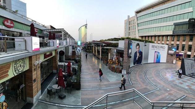 A view of the empty Cyber Hub which is one of the most popular public spaces, owing to coronavirus concerns . Malls will continue to operate, but they have been asked to disinfect common touchpoints and have their premises routinely fumigated, and ensure thermal screening at the points of entry. (Parveen Kumar / HT Photo) A view of the empty Cyber Hub which is one of the most popular public spaces, owing to coronavirus concerns . Malls will continue to operate, but they have been asked to disinfect common touchpoints and have their premises routinely fumigated, and ensure thermal screening at the points of entry. (Parveen Kumar / HT Photo)