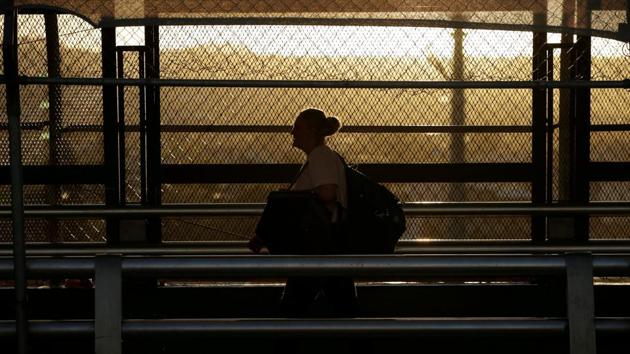 A woman walks towards El Paso, Texas, US at the international border bridge Paso del Norte, as seen from Ciudad Juarez, Mexico. (REUTERS) A woman walks towards El Paso, Texas, US at the international border bridge Paso del Norte, as seen from Ciudad Juarez, Mexico. (REUTERS)