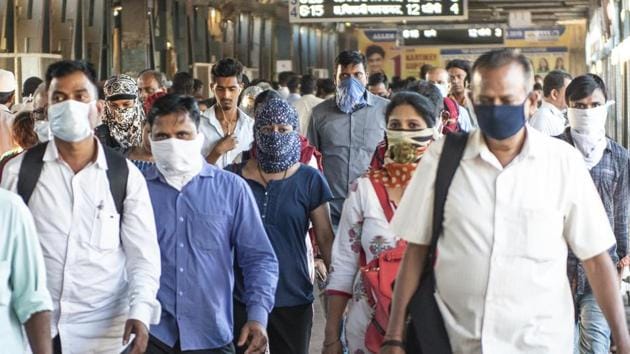 People cover their face as precautionary measure against corona virus at Kurla Station, Kurla, Mumbai, on March 19, 2020. (Photo by Aalok Soni/Hindustan Times) People cover their face as precautionary measure against corona virus at Kurla Station, Kurla, Mumbai, on March 19, 2020. (Photo by Aalok Soni/Hindustan Times)
