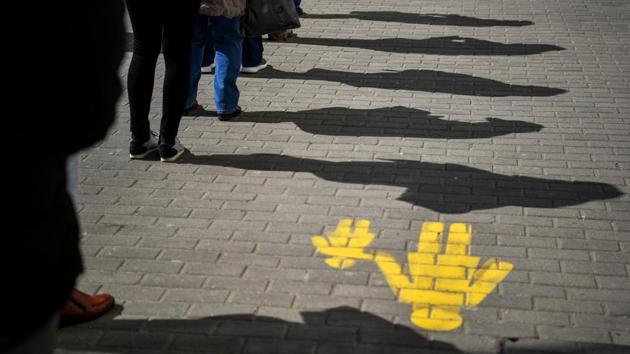The new rules of engagement call for maintaining a gap of one to two metres (or three to six feet) to prevent possible exposure when an infected individual coughs or speaks. (Zsolt Czegledi / MTI via AP) The new rules of engagement call for maintaining a gap of one to two metres (or three to six feet) to prevent possible exposure when an infected individual coughs or speaks. (Zsolt Czegledi / MTI via AP)