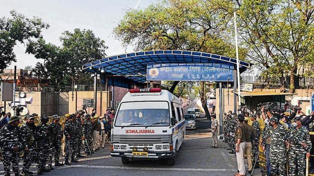 Police personnel seen as an ablulance leaves after four convicts in the December 2012 gang rape case were hanged at 5:30am in Tihar jail, at Tihar Village in New Delhi. (Photo by Biplov Bhuyan/ Hindustan Times) Police personnel seen as an ablulance leaves after four convicts in the December 2012 gang rape case were hanged at 5:30am in Tihar jail, at Tihar Village in New Delhi. (Photo by Biplov Bhuyan/ Hindustan Times)