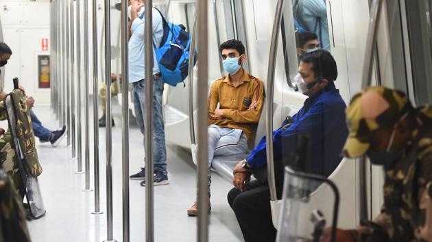 Commuters wearing face masks or with their faces generally covered as a precautionary measure against coronavirus infections, at Rajiv Chowk Metro Station in New Delhi, on Friday, March 20, 2020 (Raj K Raj/HT photo) Commuters wearing face masks or with their faces generally covered as a precautionary measure against coronavirus infections, at Rajiv Chowk Metro Station in New Delhi, on Friday, March 20, 2020 (Raj K Raj/HT photo)