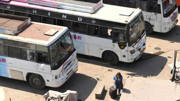 Parked buses are pictured following the Punjab state government announcement to suspend public transport services amid concerns over the spread of the COVID-19 novel coronavirus, at a bus stand in Amritsar on March 20, 2020. (Narinder Nanu / AFP) Parked buses are pictured following the Punjab state government announcement to suspend public transport services amid concerns over the spread of the COVID-19 novel coronavirus, at a bus stand in Amritsar on March 20, 2020. (Narinder Nanu / AFP)