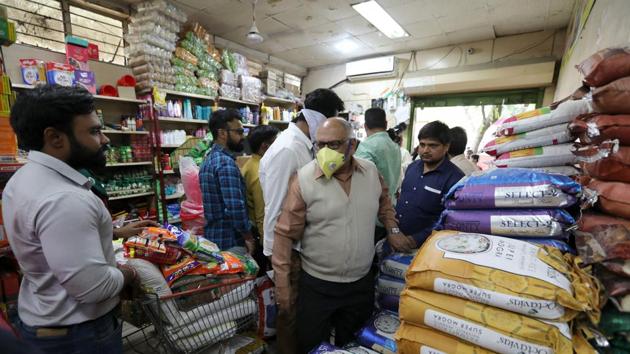 Coronavirus: People purchase food and other goods at a government store in New Delhi. (Bloomberg) Coronavirus: People purchase food and other goods at a government store in New Delhi. (Bloomberg)