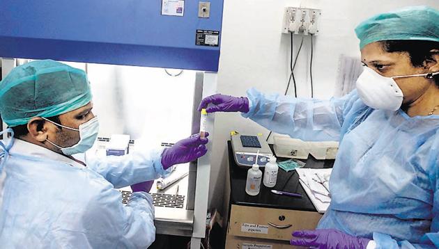 B J Government Medical College's Molecular lab prepares for coronavirus testing at Sassoon hospital in Pune. (Pratham Gokhale/HT Photo) B J Government Medical College's Molecular lab prepares for coronavirus testing at Sassoon hospital in Pune. (Pratham Gokhale/HT Photo)