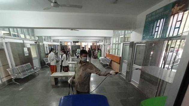 A Health Department employee sanitizes a hospital in Police Line in Chandigarh’s Sector 26 amid ocoronavirus outbreak. (Ravi Kumar/HT PHOTO) A Health Department employee sanitizes a hospital in Police Line in Chandigarh’s Sector 26 amid ocoronavirus outbreak. (Ravi Kumar/HT PHOTO)