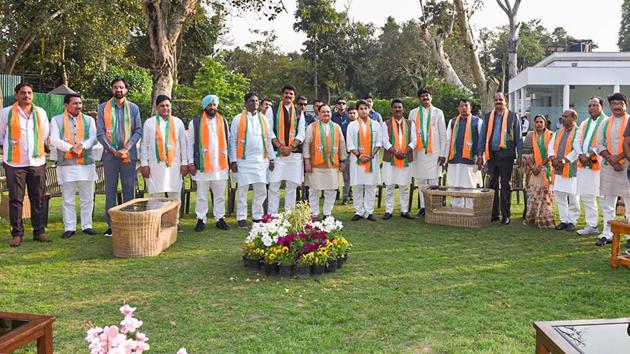 Twenty one rebel Congress MLAs from Madhya Pradesh meet BJP National President JP Nadda in the presence of BJP leader Jotiraditya Scindia, in New Delhi. After the 21 MLAs deserted the Kamal Nath government, the veteran Congress leader resigned from his post just ahead of a crucial floor test. (PTI)