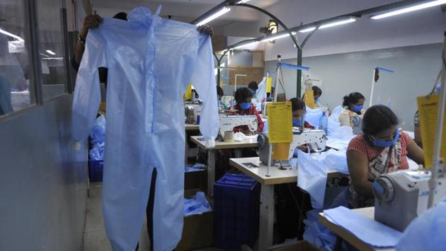 Protective suits for medical use being produced at a factory in Noida. There has been an increase in the demand for full body gowns, masks and other supplies due to the coronavirus outbreak. (Sunil Ghosh / HT Photo)