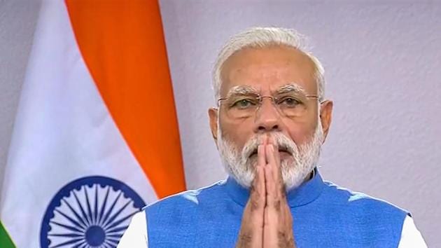 Prime Minister Narendra Modi gestures during his address to the nation on coronavirus pandemic(PTI)