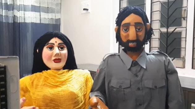 The video portrays a story where a man coughs and shows flu-like symptoms and is advised by his wife and daughter to consult a doctor. (YouTube/Tripura Puppet Theatre) The video portrays a story where a man coughs and shows flu-like symptoms and is advised by his wife and daughter to consult a doctor. (YouTube/Tripura Puppet Theatre)