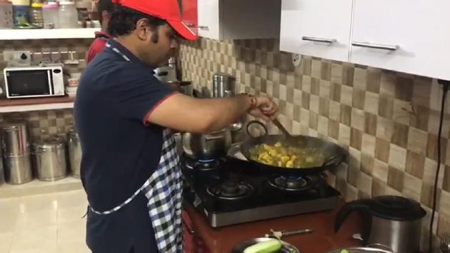UP energy minister Shrikant Sharma cooking in his house on Sunday. (ht photo) UP energy minister Shrikant Sharma cooking in his house on Sunday. (ht photo)