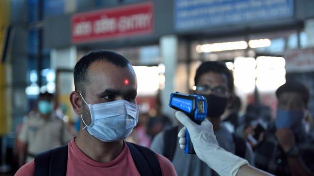 A passenger being tested for temperature at Mumbai’s Lokmanya Tilak Terminus,Sunday, March 22, 2020. Maharashtra has reported the maximum number of coronavirus infections in the country so far. (Satish Bate /HT Photo) A passenger being tested for temperature at Mumbai’s Lokmanya Tilak Terminus,Sunday, March 22, 2020. Maharashtra has reported the maximum number of coronavirus infections in the country so far. (Satish Bate /HT Photo)
