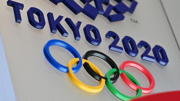 (FILES) In this file photo taken on March 15, 2020 The logo for the Tokyo 2020 Olympic Games is seen in Tokyo (AFP) (FILES) In this file photo taken on March 15, 2020 The logo for the Tokyo 2020 Olympic Games is seen in Tokyo (AFP)