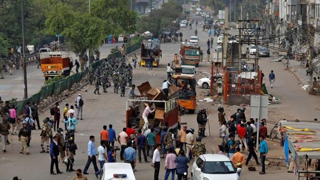 Police clear the site of the longest-running protest. (REUTERS)