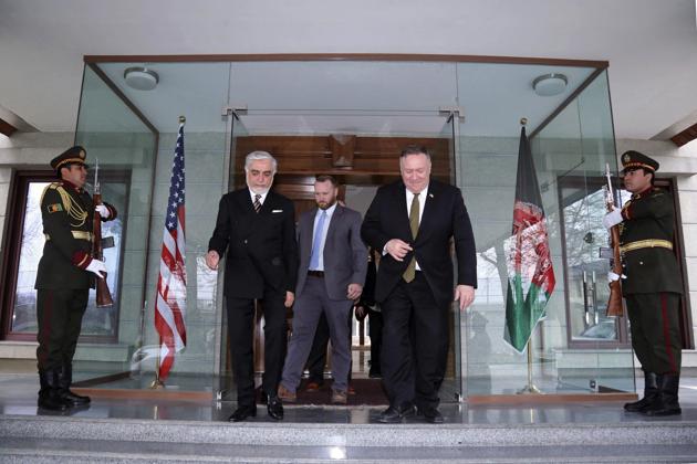 U.S. Secretary of State Mike Pompeo, center right, and Abdullah Abdullah the main political rival of President Ashraf Ghani, center left, walk at the Sepidar palace, in Kabul, Afghanistan, Monday, March 23, 2020. (AP) U.S. Secretary of State Mike Pompeo, center right, and Abdullah Abdullah the main political rival of President Ashraf Ghani, center left, walk at the Sepidar palace, in Kabul, Afghanistan, Monday, March 23, 2020. (AP)