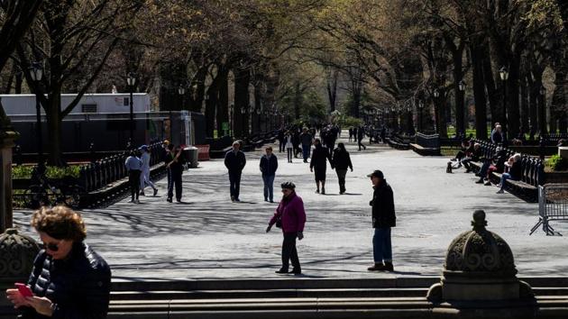 People out at Central Park in New York, on March 21, 2020. Trump said he believes the American economy, which has been virtually shut down, could be reopened in weeks, not months. He told reporters Monday, he would be “opening up our country to business because our country was meant to be open.” (Eduardo Munoz / REUTERS)