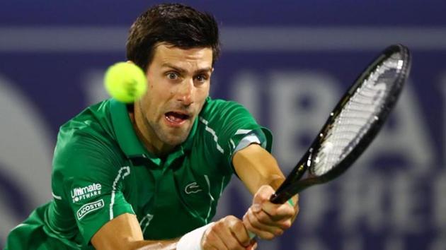 Serbia's Novak Djokovic in action during his Final match against Greece's Stefanos Tsitsipas. (REUTERS) Serbia's Novak Djokovic in action during his Final match against Greece's Stefanos Tsitsipas. (REUTERS)
