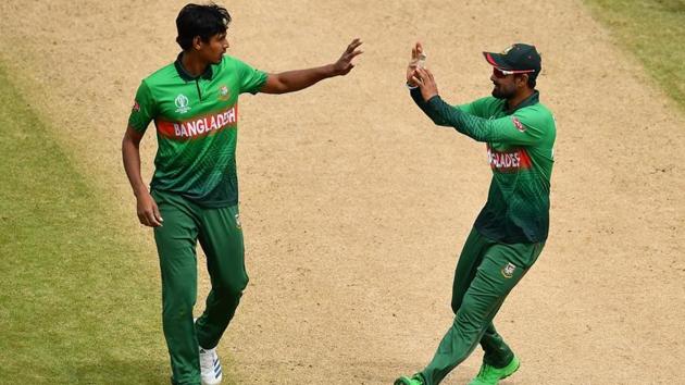 Mustafizur Rahman of Bangladesh celebrates the wicket of Hardik Pandya of India with Liton Das of Bangladesh.(Getty Images)