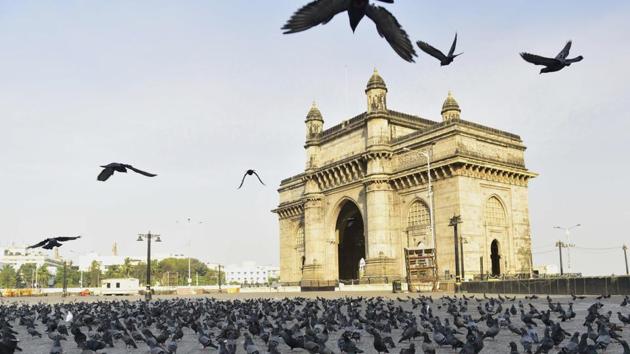 A flock of pigeons were the only visitors to the Gateway Of India, in Mumbai on Tuesday, March 24, 2020 during a lockdown by state governments and Union Territories that was observed across the majority of India. Underlining the gravity of the outbreak and its rapid spread, PM Modi emphasised the importance of “social distancing” as the one and only way to break the chain of transmission. (Anshuman Poyrekar / HT Photo)