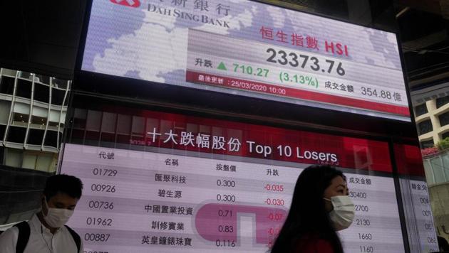 Shares have advanced in Asia after the Dow Jones Industrial Average surged to its best day since 1933 as Congress and the White House neared a deal on Tuesday to inject nearly $2 trillion of aid into an economy ravaged by the coronavirus.(AP photo)