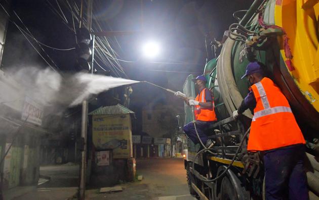 Municipal workers spray disinfectant in Agartala to check the spread of coronavirus (ANI) Municipal workers spray disinfectant in Agartala to check the spread of coronavirus (ANI)