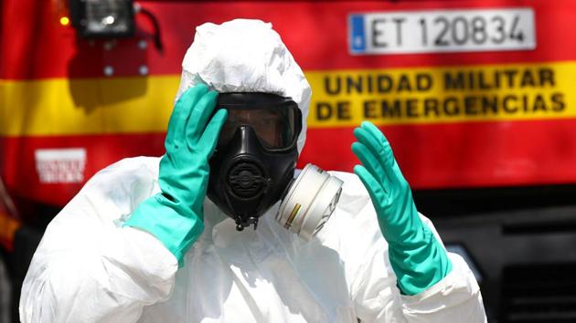 A member of Emergency Military Unit (UME) prepares to disinfect in a special facility for psychically disabled people during the coronavirus disease (COVID-19) outbreak in Getafe, Spain. (REUTERS) A member of Emergency Military Unit (UME) prepares to disinfect in a special facility for psychically disabled people during the coronavirus disease (COVID-19) outbreak in Getafe, Spain. (REUTERS)
