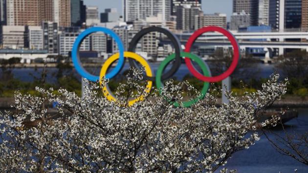After weeks of hedging, the IOC took the unprecedented step of postponing the world's biggest sporting event (AP) After weeks of hedging, the IOC took the unprecedented step of postponing the world's biggest sporting event (AP)