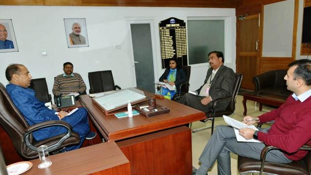 Chief minister Jai Ram Thakur presiding over a meeting with of senior officials to review availability of essential commodities at fair price shops in state(HT photo)