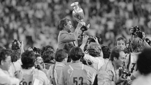 French team coach Michel Hidalgo raises the 1984 European Championship cup. (AP) French team coach Michel Hidalgo raises the 1984 European Championship cup. (AP)