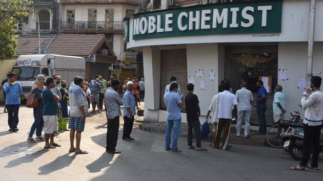 People in a queue outside a medical store in Mumbai during the nationwide lockdown in the wake of coronavirus on Wednesday. (Bhushan Koyande/ HT Photo) People in a queue outside a medical store in Mumbai during the nationwide lockdown in the wake of coronavirus on Wednesday. (Bhushan Koyande/ HT Photo)