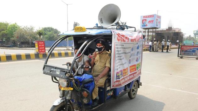 Police make announcements over a loudspeaker from an e-rickshaw, in Patna. The union home ministry has asked state governments to check the spread of rumours about shortages. It has also asked them to take actions to ally apprehensions and maintain peace, and inform people about the availability of food, medicine and other essential commodities. (A P Dube / HT Photo) Police make announcements over a loudspeaker from an e-rickshaw, in Patna. The union home ministry has asked state governments to check the spread of rumours about shortages. It has also asked them to take actions to ally apprehensions and maintain peace, and inform people about the availability of food, medicine and other essential commodities. (A P Dube / HT Photo)