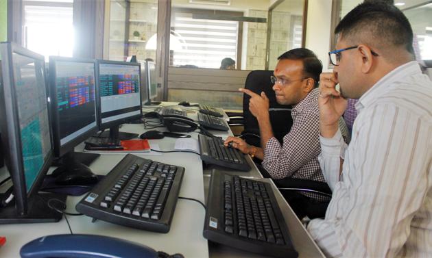 Share brokers monitor the Sensex (Photo used for representational purpose only)(ANI File)